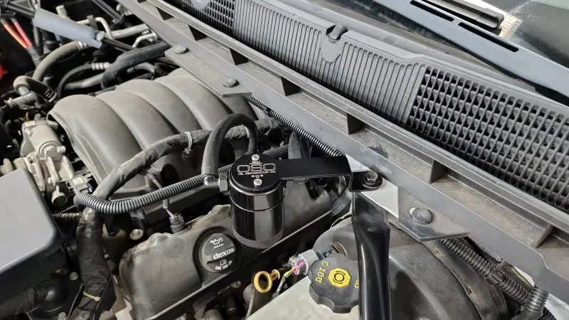 J&L 14-18 Chevy Silverado 1500 / 14-18 Gmc Sierra 1500 4.3L V6 Oil Separator - Black Anodized 2